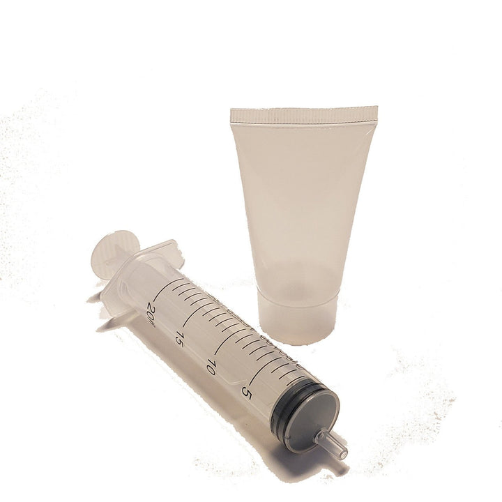 Reusable Cleaning Solution Container and Syringe